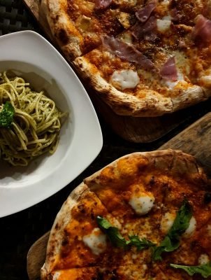 high-angle-view-pizza-served-plate